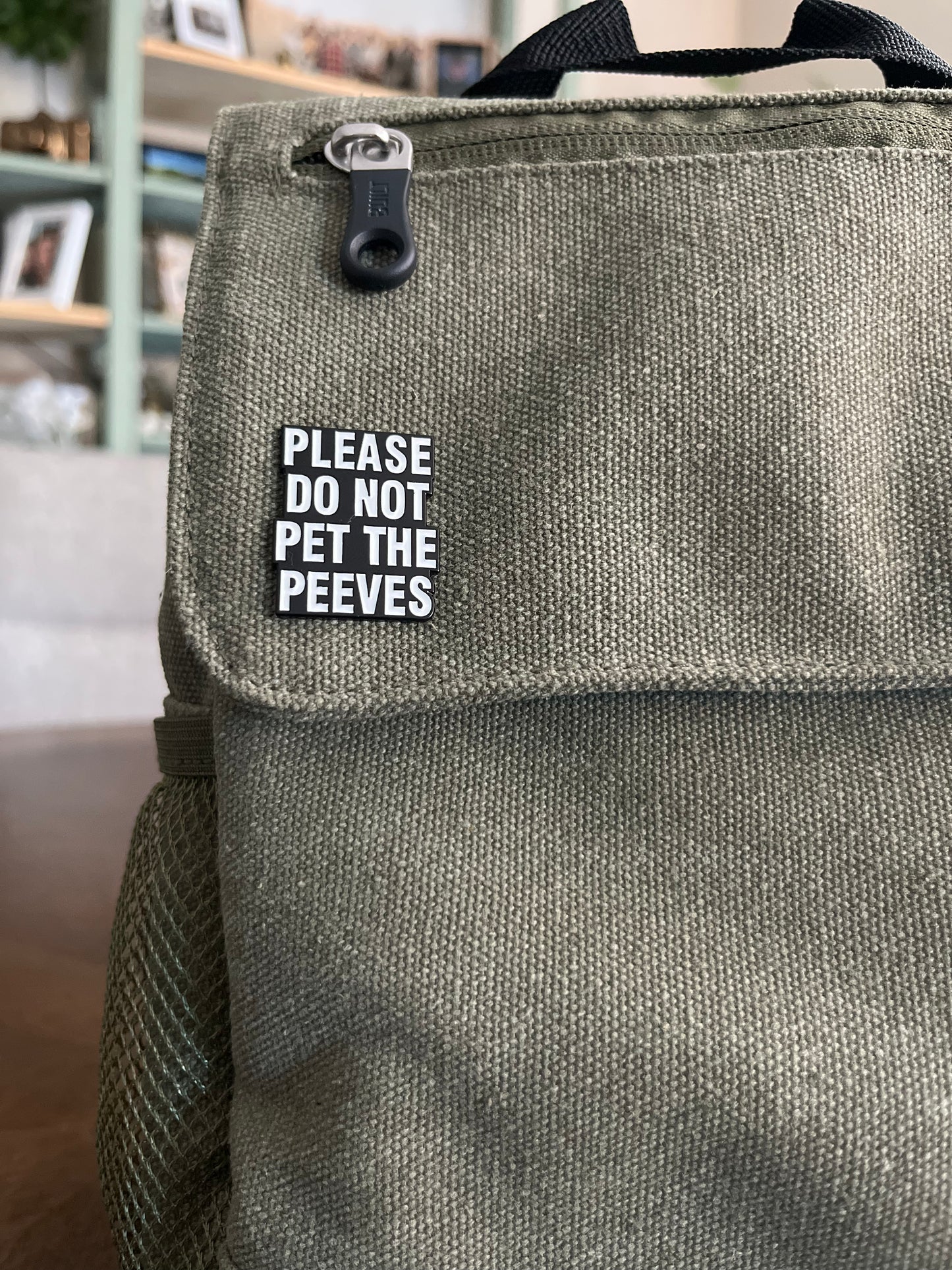 Don't Pet The Peeves Pin